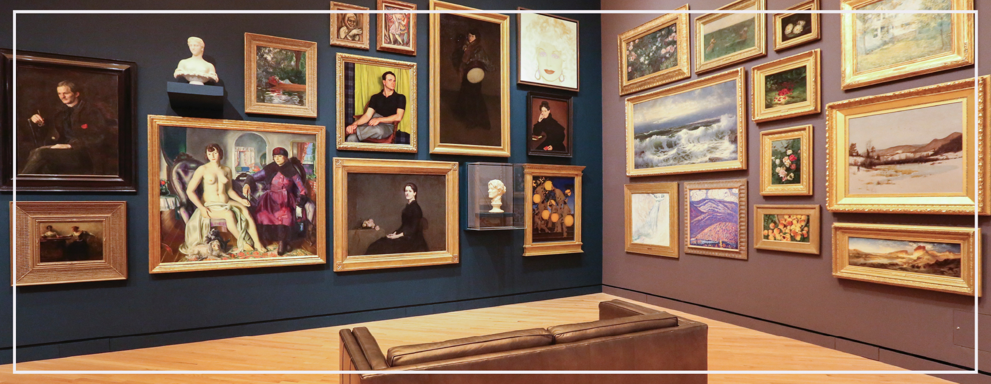 exhibition gallery with paintings covering the wall