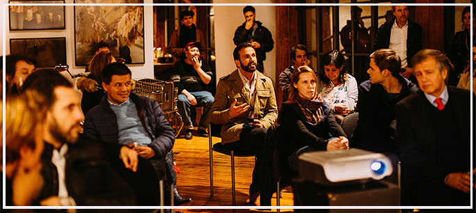 artist lecture with engaging crowd discussion